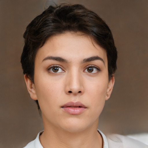 Neutral white young-adult female with short  brown hair and brown eyes