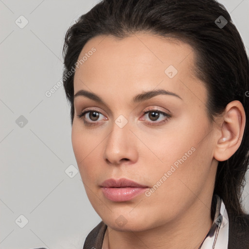 Neutral white young-adult female with long  brown hair and brown eyes