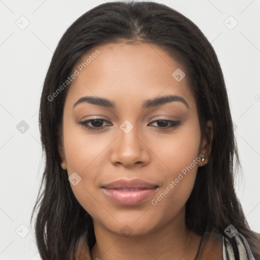 Joyful latino young-adult female with long  brown hair and brown eyes