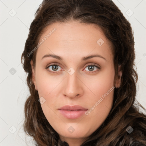 Joyful white young-adult female with long  brown hair and green eyes