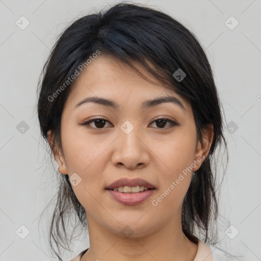 Joyful asian young-adult female with medium  brown hair and brown eyes