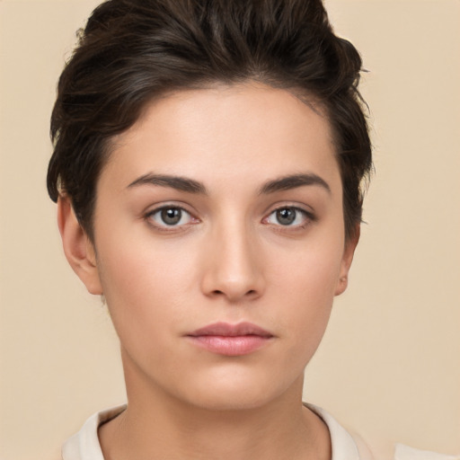 Neutral white young-adult female with short  brown hair and brown eyes