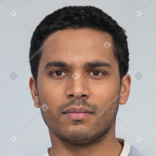 Neutral latino young-adult male with short  black hair and brown eyes