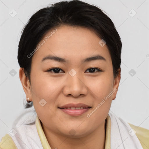 Joyful asian young-adult female with short  brown hair and brown eyes