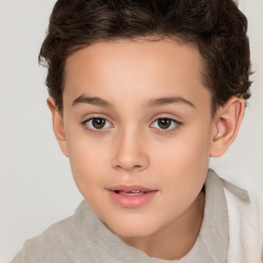 Joyful white child female with short  brown hair and brown eyes