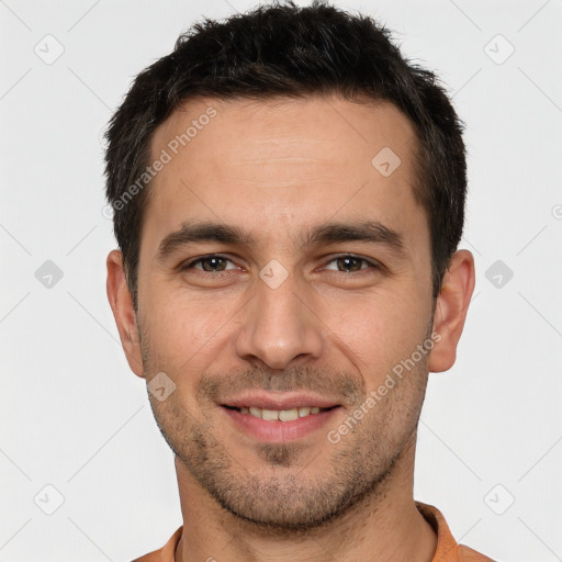 Joyful white young-adult male with short  brown hair and brown eyes