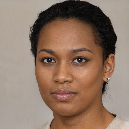 Neutral latino young-adult female with short  black hair and brown eyes