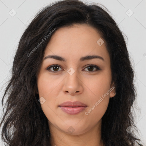 Joyful latino young-adult female with long  brown hair and brown eyes