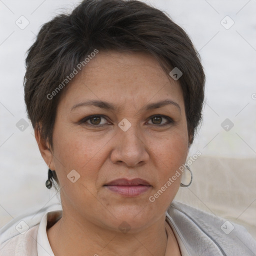 Joyful white adult female with short  brown hair and brown eyes