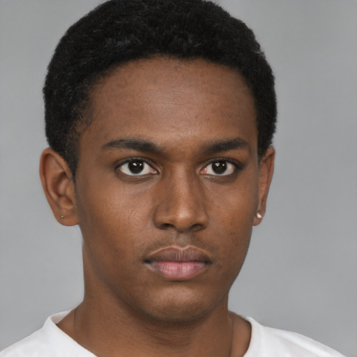 Neutral black young-adult male with short  brown hair and brown eyes
