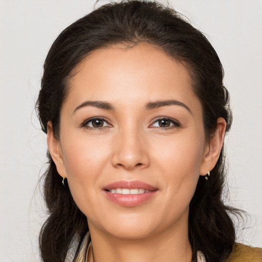 Joyful white young-adult female with long  brown hair and brown eyes