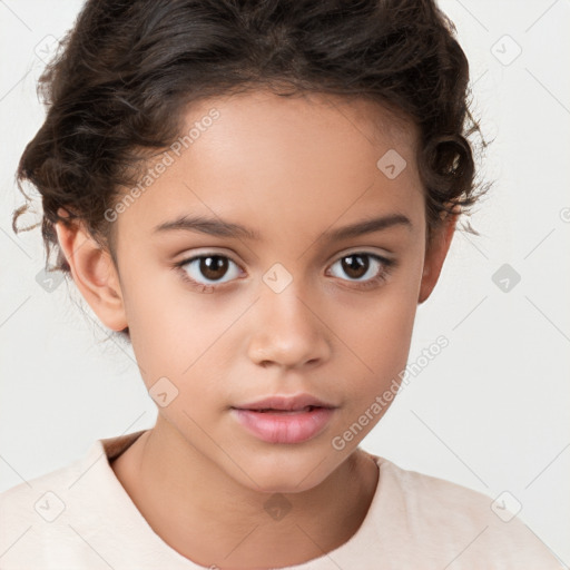 Joyful white child female with short  brown hair and brown eyes