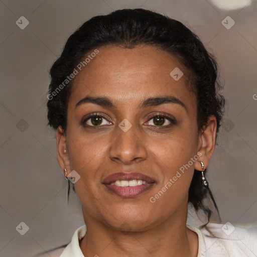 Joyful black young-adult female with medium  brown hair and brown eyes