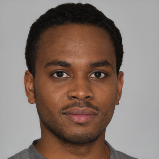 Neutral black young-adult male with short  brown hair and brown eyes