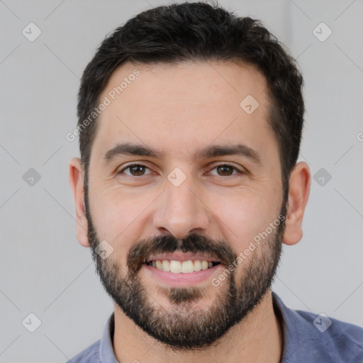 Joyful white young-adult male with short  black hair and brown eyes