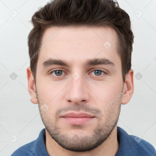 Neutral white young-adult male with short  brown hair and grey eyes