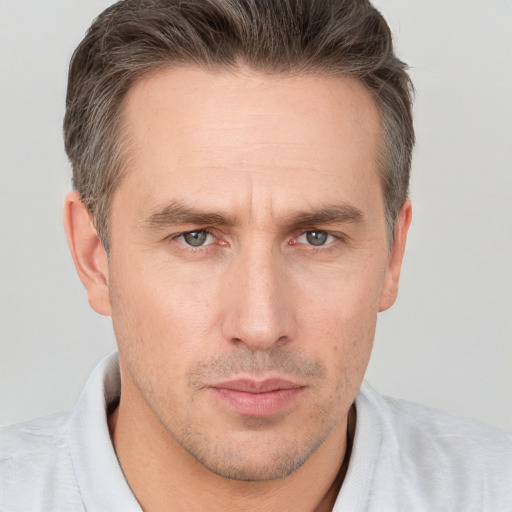 Neutral white adult male with short  brown hair and brown eyes