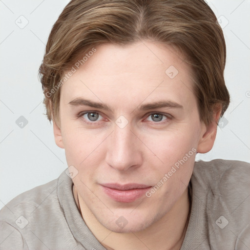 Joyful white young-adult female with short  brown hair and grey eyes