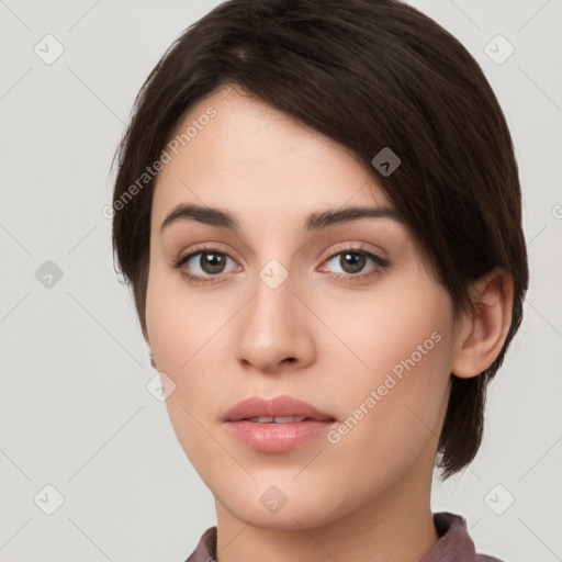 Neutral white young-adult female with medium  brown hair and brown eyes