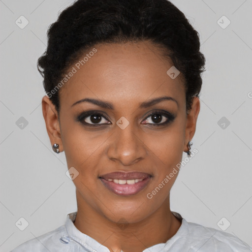 Joyful black young-adult female with short  black hair and brown eyes