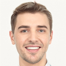 Joyful white young-adult male with short  brown hair and brown eyes