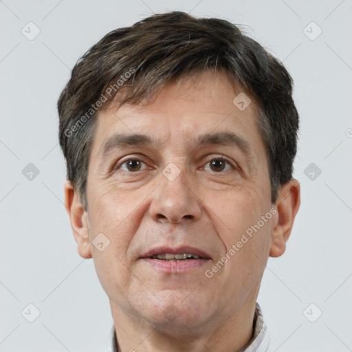 Joyful white middle-aged male with short  brown hair and brown eyes