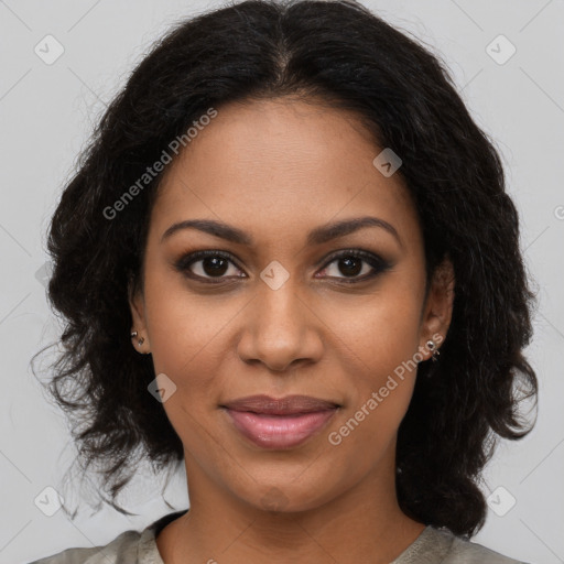 Joyful black young-adult female with long  brown hair and brown eyes