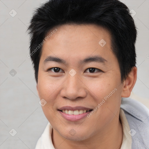 Joyful asian young-adult female with short  brown hair and brown eyes