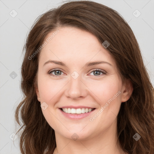 Joyful white young-adult female with long  brown hair and green eyes