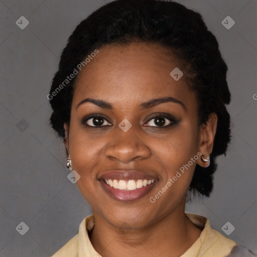 Joyful black young-adult female with medium  black hair and brown eyes