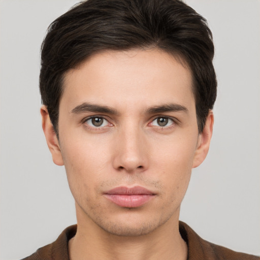 Neutral white young-adult male with short  brown hair and brown eyes