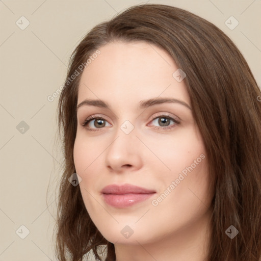 Neutral white young-adult female with long  brown hair and brown eyes