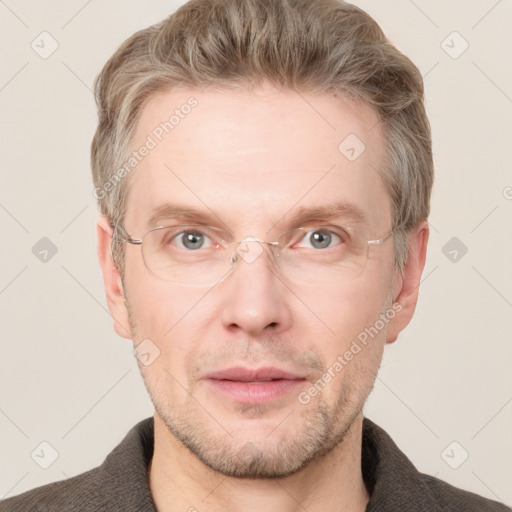 Joyful white adult male with short  brown hair and grey eyes