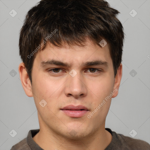 Neutral white young-adult male with short  brown hair and brown eyes