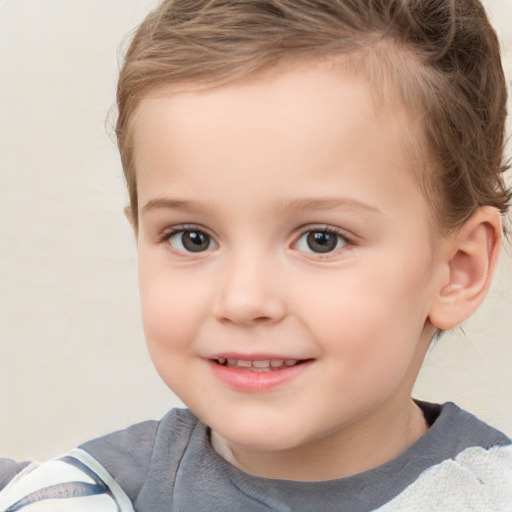 Joyful white child female with short  brown hair and brown eyes