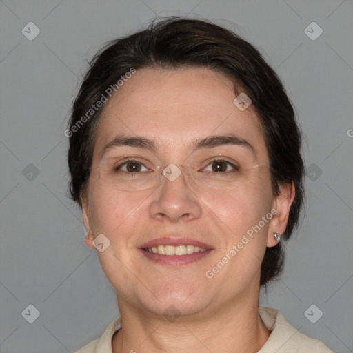 Joyful white adult female with medium  brown hair and brown eyes