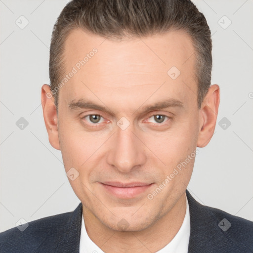 Joyful white adult male with short  brown hair and brown eyes