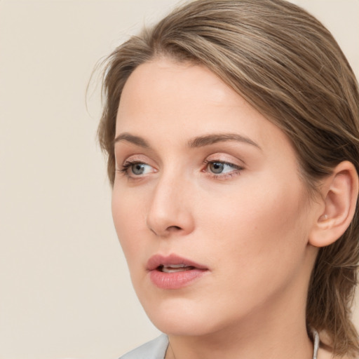 Neutral white young-adult female with medium  brown hair and grey eyes