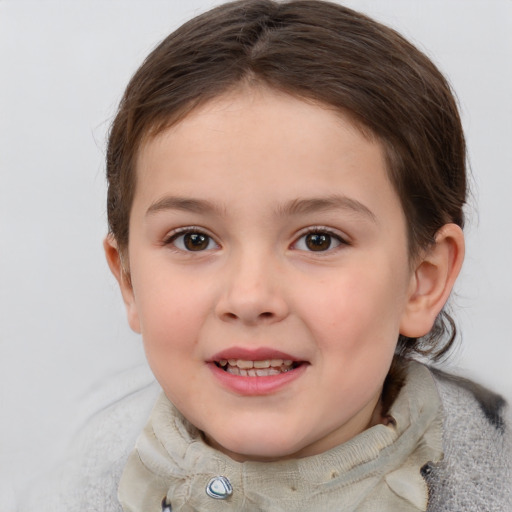 Joyful white child female with medium  brown hair and brown eyes