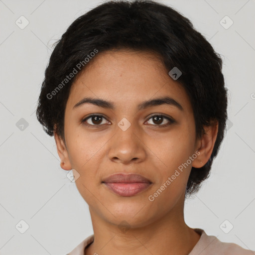 Joyful latino young-adult female with short  black hair and brown eyes