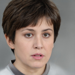 Neutral white young-adult female with short  brown hair and brown eyes