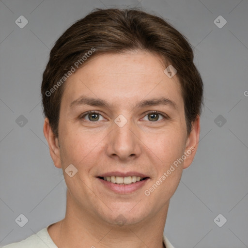 Joyful white young-adult female with short  brown hair and grey eyes