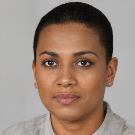 Neutral black young-adult female with short  black hair and brown eyes