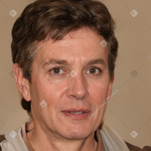 Joyful white adult male with short  brown hair and grey eyes