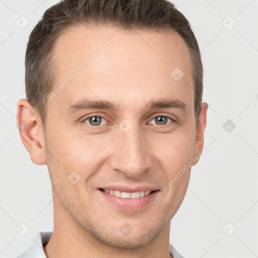 Joyful white young-adult male with short  brown hair and brown eyes