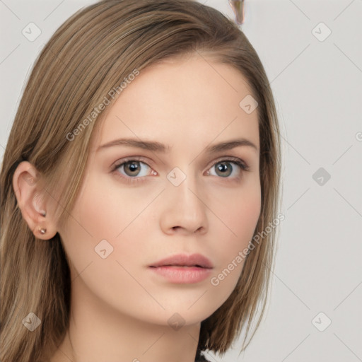 Neutral white young-adult female with long  brown hair and brown eyes