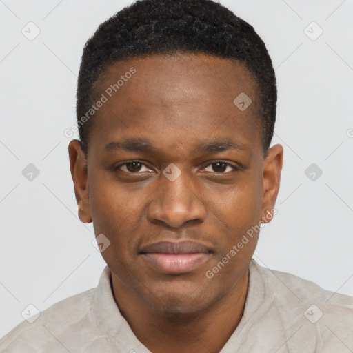 Joyful black young-adult male with short  brown hair and brown eyes
