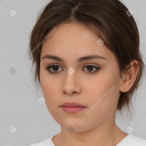 Neutral white young-adult female with medium  brown hair and brown eyes