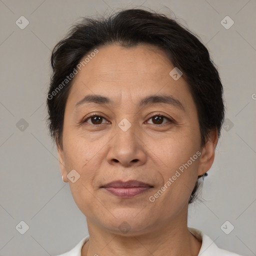 Joyful white adult female with short  brown hair and brown eyes