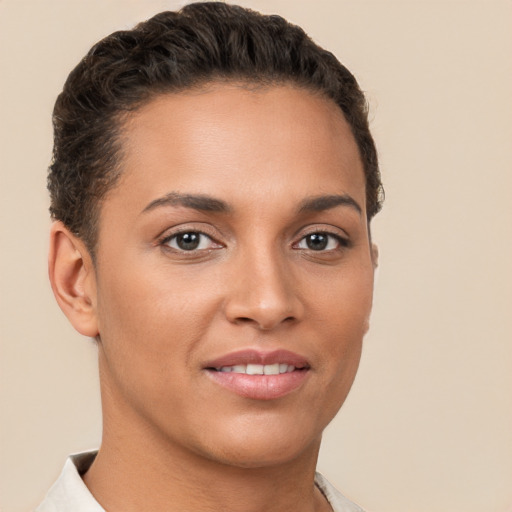 Joyful white young-adult female with short  brown hair and brown eyes